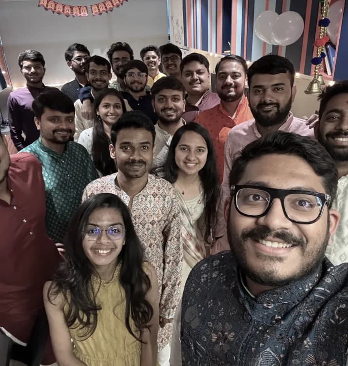 The team together during an office celebration